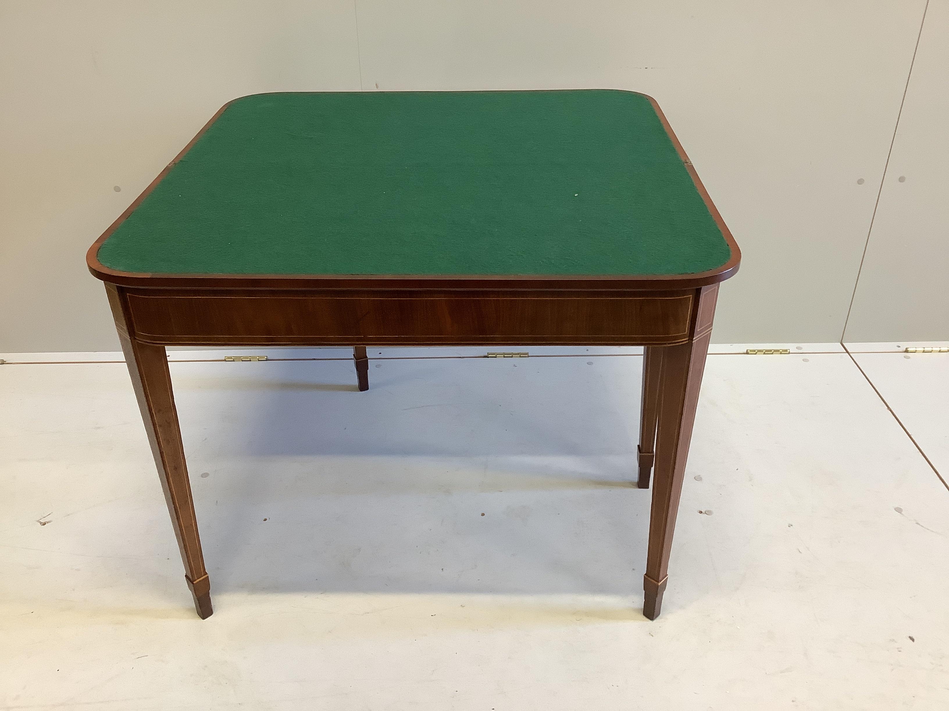 A George III satinwood banded mahogany folding card table, width 90cm, depth 45cm, height 71cm